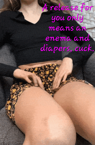 Submitted by Users 🔥 Humiliation Gifs Chastity hotwife caption: A woman in floral shorts sits submissively, hand over crotch, awaiting enema and diapers as per text overlay. Power dynamic clear, roles defined. Cuck’s Humiliation: Enema and Diapers Await