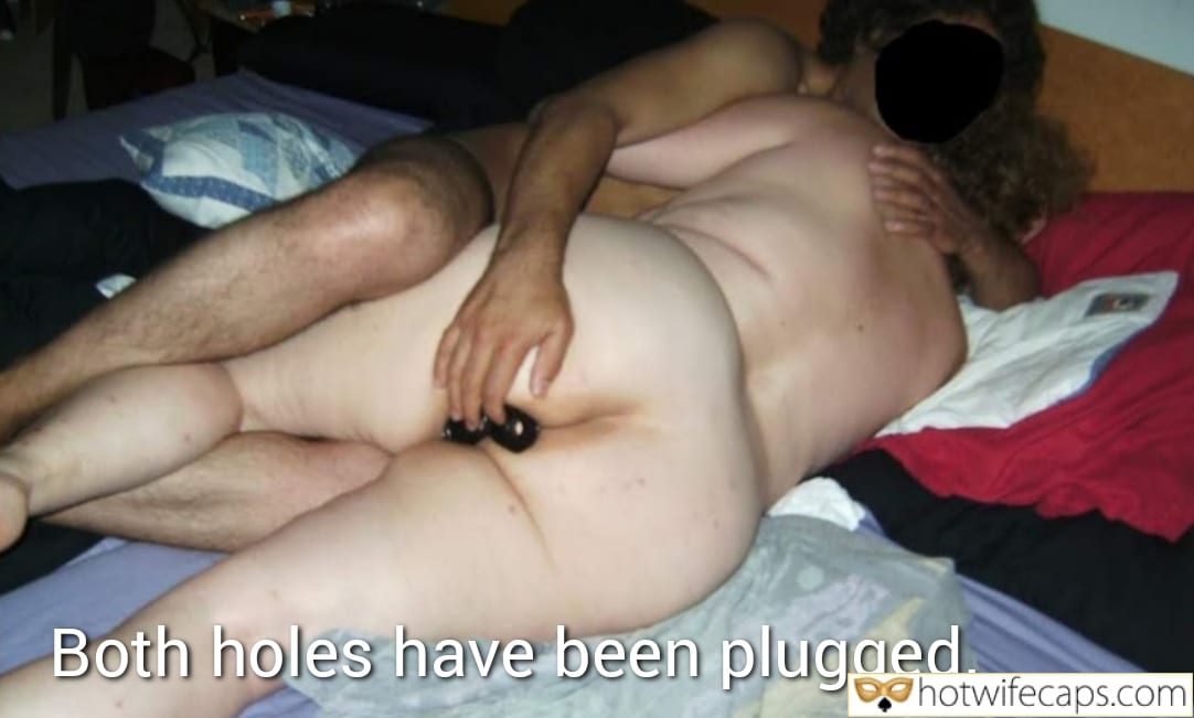 Wife Sharing Submitted by Users 🔥 Cuckold Stories Bull Anal hotwife caption: A bedroom scene featuring a thick, nude woman with a plugged ass and a man behind her, suggesting intense sexual activity and power dynamics. Thick MILF Gets Both Holes Filled by Her Bull
